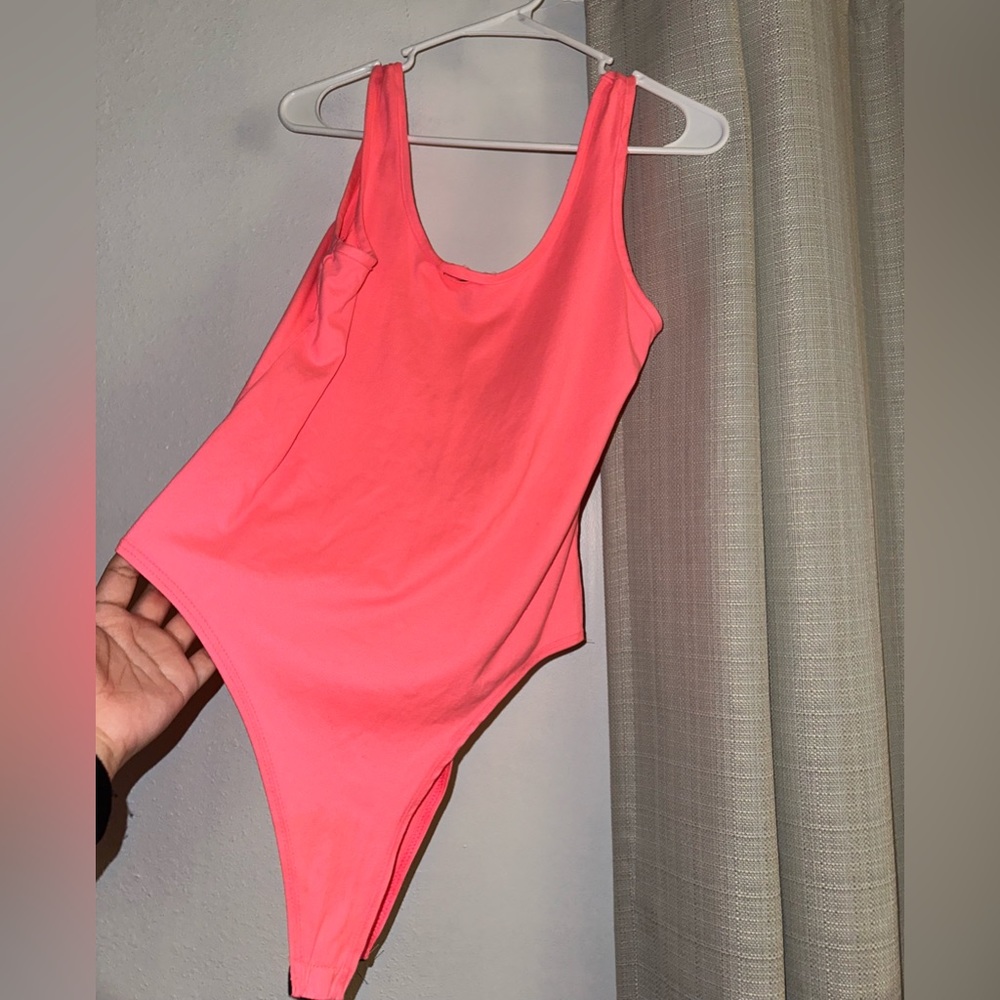 Neon pink bodysuit